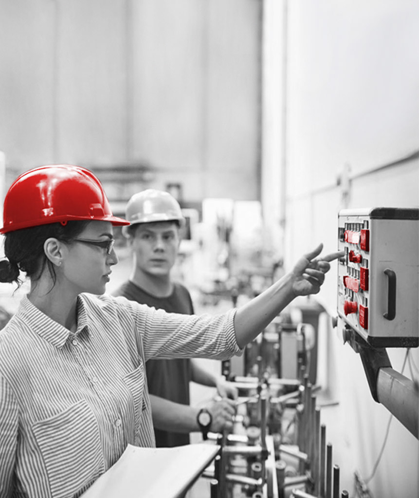 team lead showing worker electrical pannel